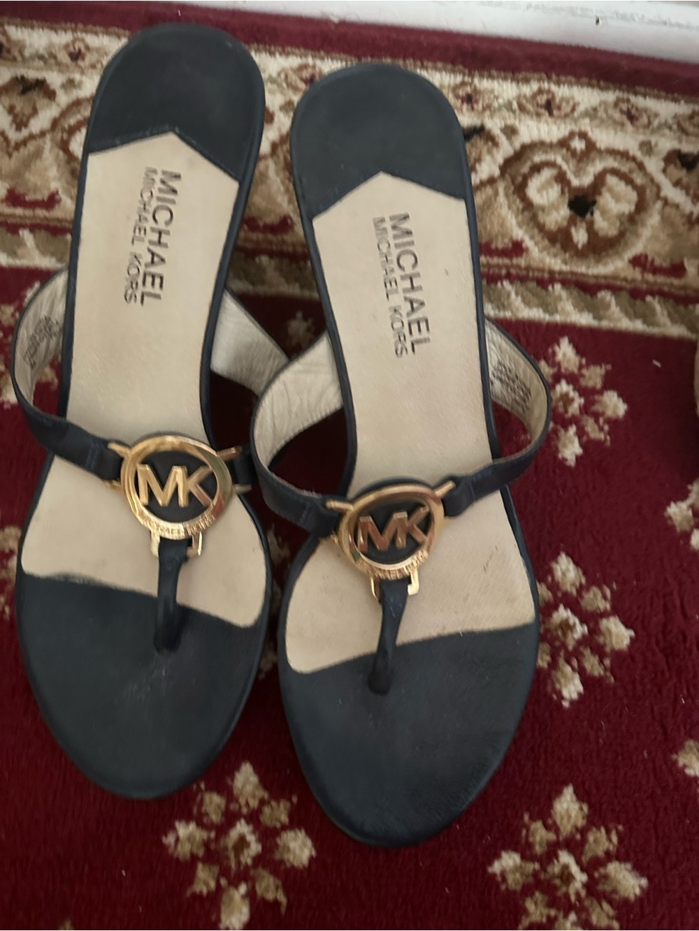 Michael Kors Black Slip-On Thong Sandals with Gold MK Emblem